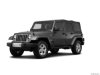 Pre-Owned 2014 Jeep Wrangler Unlimited Willys Wheeler Edition