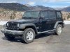 Pre-Owned 2014 Jeep Wrangler Unlimited Sport