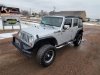 Pre-Owned 2010 Jeep Wrangler Unlimited Sport
