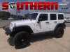 Pre-Owned 2014 Jeep Wrangler Unlimited Sahara